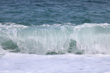 Beautiful turquoise wave in Mediterranean Sea, Greece