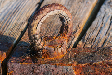 Rusty metal objects. Aggressive environment destroys metal. Corrosion of metal.