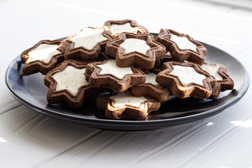 Homemade cookies with chocolate on a plate closeup