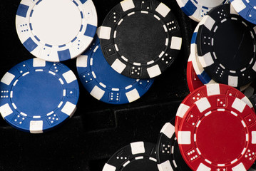 Colourful poker chips in close-up.