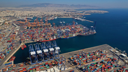 Aerial drone photo of industrial cargo container terminal in commercial port of Piraeus, Attica, Greece