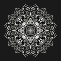 Ornamental abstract ethnic mandala element on dark background