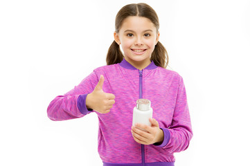 Vitamin concept. Need vitamin supplements. Healthy lifestyle. Health care. Investment into health. Take vitamin supplements. Child take medicines. Treatment and medicine. Girl hold medicines bottle