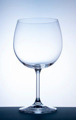 Wine glass on a white background with a light blue gradient