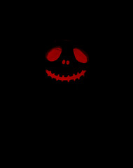 red lighting pumpkin in dark