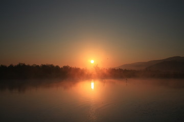 Obraz premium sunrise over lake