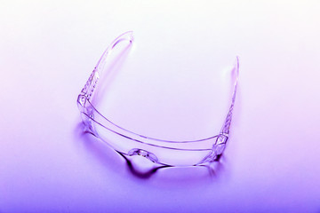 Photo white protective spectacles on white background isolated, close up full face. Safety glasses isolated on white