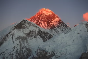 Fotobehang Mount Everest Everest. Red rays of the sun. Mountain landscape. Nepal