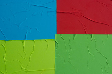 Multi-colored crumpled sheets of paper close-up.