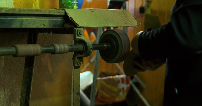 Woman Shoemaker making a par of shoes