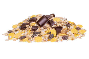 A heap of dry muesli and pieces of chocolate. Healthy breakfast