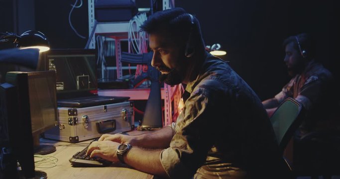 Soldier following car movement on computer