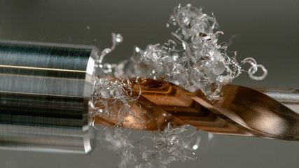 MACRO: Lathe tool spot drilling a hole into center of cylinder shaped workpiece.