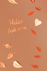 Paper craft, red and yellow Autumn leaves with text 