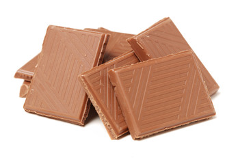 Chocolate pieces isolated on white background