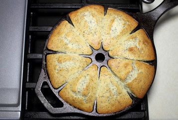 Poppy seed cake fresh out of the oven, made in a cast iron wedgepan.