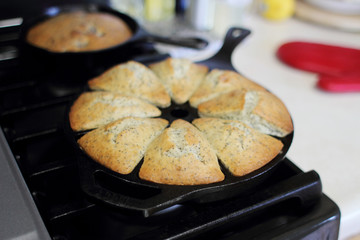 Poppy seed cake fresh out of the oven, made in a cast iron wedgepan and 6 inch skillet.