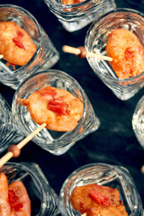 close-up canape with shrimp in glass soft background