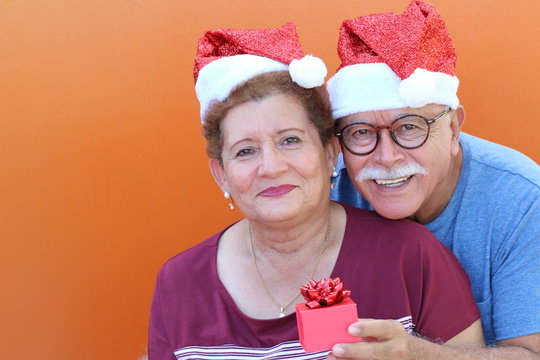 Senior Hispanic Couple Celebrating Christmas