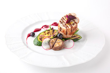Meat roll with grilled vegetables. Banquet festive dishes. Fine dining restaurant menu. White background.
