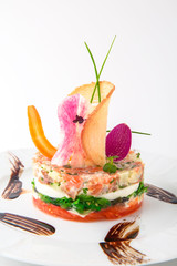 Salad of salmon, avocado, seaweed, mozzarella and fresh vegetables. Dietary, nutritious and tasty. Banquet festive dishes. Gourmet restaurant menu. White background.