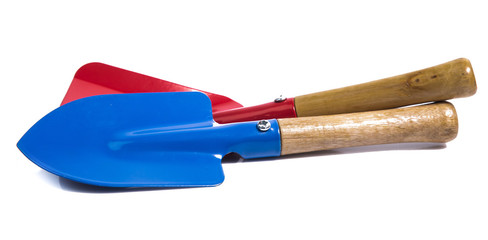 Garden tools shovel and fork isolated on white background