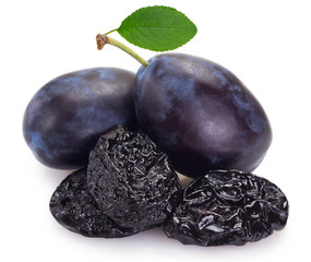 Fresh plums with prunes on white background