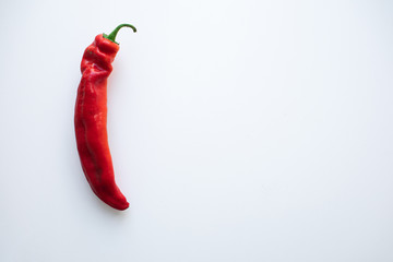 red pepper on white background. flat lay