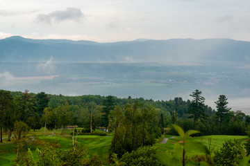 Foggy day by the St-Laurent river, golf field 