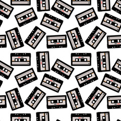 Seamless pattern in retro style with audio cassettes