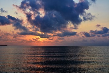 sunrise with clouds on the seashore