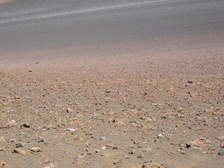 Ash and volcanic debris field inside crater of dormant volcano Haleakala in Maui Hawaii 