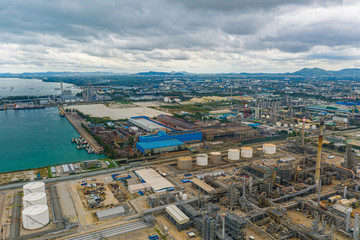 Aerial view of oil and gas industrial in Rayong province. Refinery factory oil storage tank.