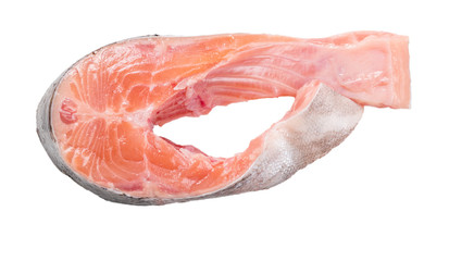 Raw salmon fillet on a white background. Trout fillet with rosemary. Wild atlantic fish