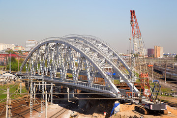 Under construction railway bridge over the railway tracks.Horizontally.Vertically.