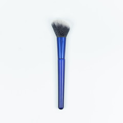 Blue brushes for makeup isolated on white background.