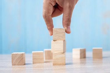 wooden block on the building. Business planning, Risk Management, Solution, strategy, different and Unique Concepts