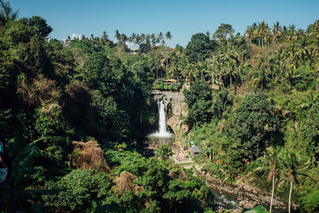 Fototapeta na wymiar Tegenungan Waterfall in Bali jungle