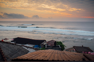 Perfect sunset waves at Uluwatu, Bali