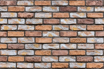 Closed up orange brick wall texture. Architectural material construction.