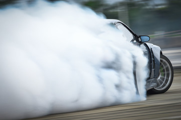 Drift car with  smoke from burning tires