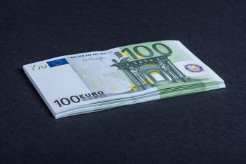 Euro cash on a pink and black background. Euro Money Banknotes. Euro Money. Euro bill. Place for text.