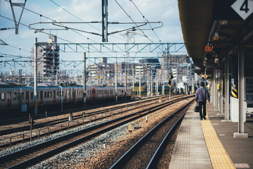 철길을 걷는 남자 ( A man walking on a railroad track )