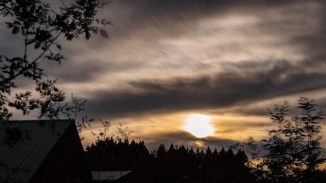 Watch this beautiful timelapse as the sun sets for the night, the clouds move across the sky, ever changing throughout the day.