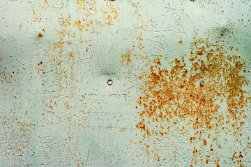 Metal texture with scratches and cracks which can be used as a background