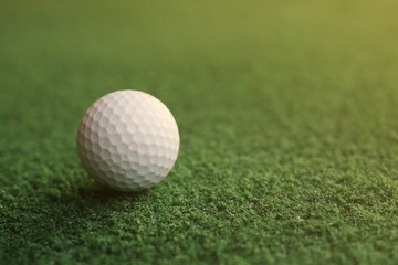 golf ball on green grass