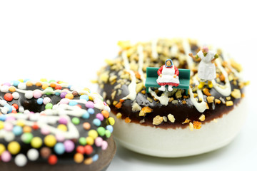 Miniature people : Fat oldman sitting on tape Measure with junkfood ,Healthcare and diet concept.