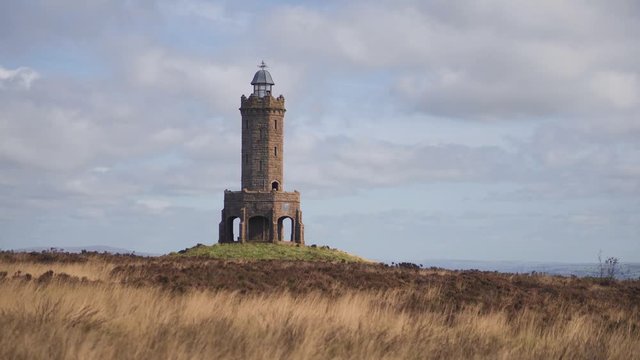 A view of Darwen Tower in Lancashire on a windy day