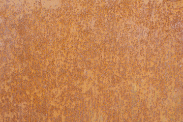 Rusty metal sheet of brown yellow color