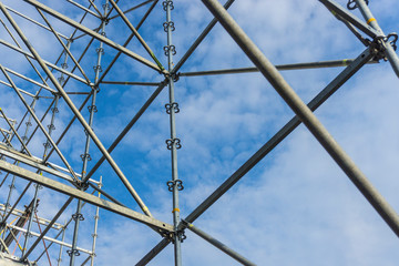 Metal girder extensive scaffolding providing platforms for stage structure support